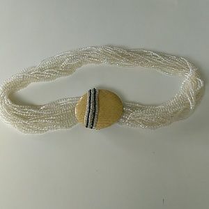 Translucent seed glass beads and snakeskin belt